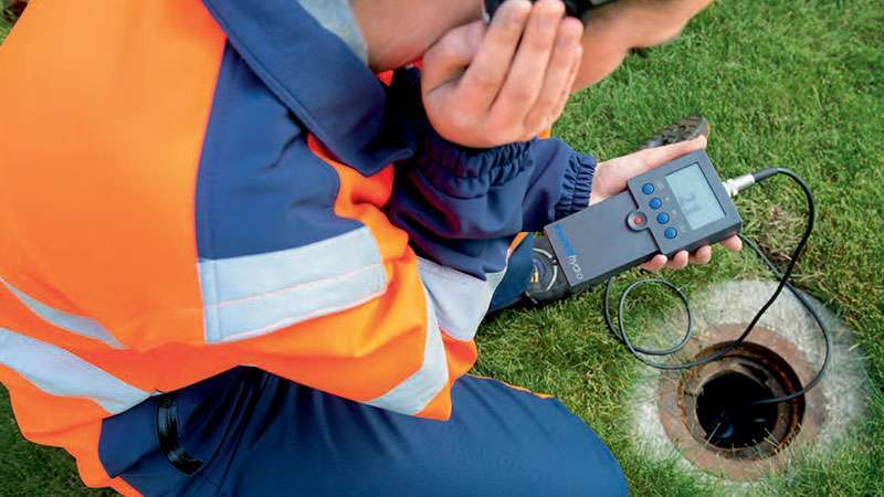 24 Group Jettingleak-detector-header Drain camera inspection in progress with a technician monitoring underground drainage system through diagnostic equipment.